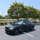BMW 2 Series Coupe F22 2013-2021 black roof rack cross bars fitted to factory fixed mounting points
