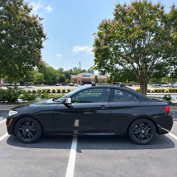 Vehicle fitment example of black fix point roof rack cross bars on BMW 2 Series Coupe F22 2013-2021