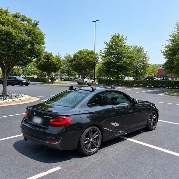 BMW 2 Series Coupe F22 2013-2021 with black fix point roof rack cross bars installed