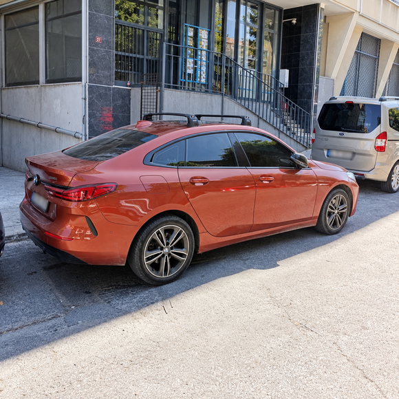 BMW 2 Series Gran Coupe F44 2020-2024 with black fix point roof rack cross bars installed