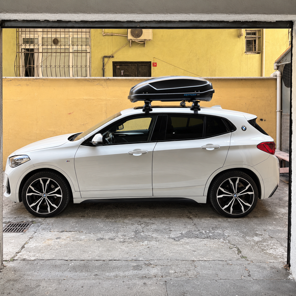 Vehicle fitment example of silver normal roof cross bars on BMW 2 Series Active Tourer F45 2014-2021 with no factory roof rails
