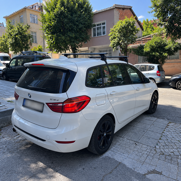 Vehicle fitment example of silver normal roof cross bars on BMW 2 Series Gran Tourer F46 2014-2021 with no factory roof rails