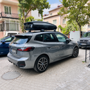 Vehicle fitment example of silver flush rail roof rack cross bars on BMW 2 Series Active Tourer U06 2022-Up
