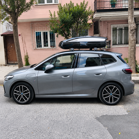 BMW 2 Series Active Tourer U06 2022-Up with silver roof rack cross bars installed on flush integrated roof rails