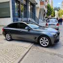 BMW 5 Series GT F07 2009-2017 with black fix point roof rack cross bars installed
