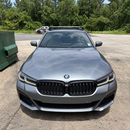Vehicle fitment example of silver fix point roof rack cross bars for BMW 5 Series Sedan G30 2016-2023