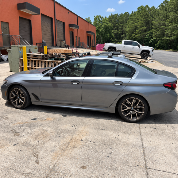 BMW 5 Series Sedan G30 2016-2023 with silver fix point roof rack cross bars installed