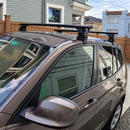 Lockable roof rack cross bars with anti-theft key system