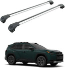Two roof racks on a white background with a green SUV below.
