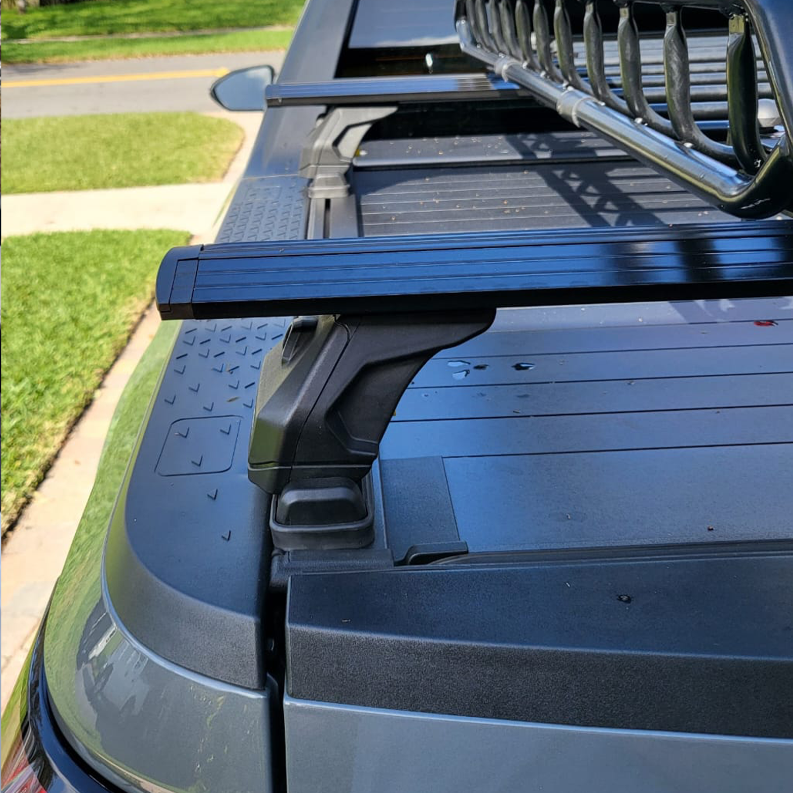 For RAM 1500 (2009-2025) Bed Rack Cross Bars with Metal Brackets (Aluminum, Black) + RealTruck Tonneau Cover w/ T-Slot Rails