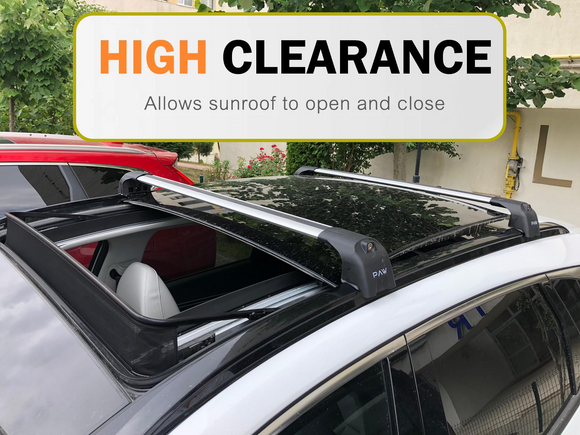 Car with roof rack system and 'High Clearance' label on a vehicle background